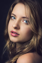 Close up portrait from a beautiful young woman