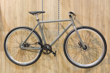 Fototapeta na wymiar Bicycle hanged on wall