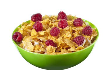 bowl of cereal and raspberries and milk