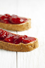 two toast with strawberry jam