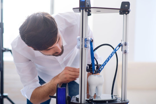 Pleasant Man Using 3d Printer 