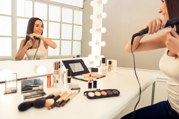 Beautiful girl doing makeup