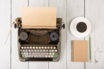 writer's workplace - wooden desk with typewriter