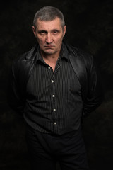 Fototapeta premium portrait of handsome serious senior man