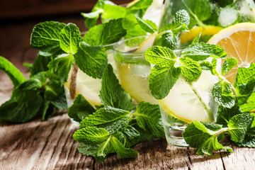 Alcoholic cocktail Parkside Fizz with mint, lemon juice, almond