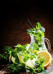 Alcoholic cocktail Parkside Fizz with mint, lemon juice, almond