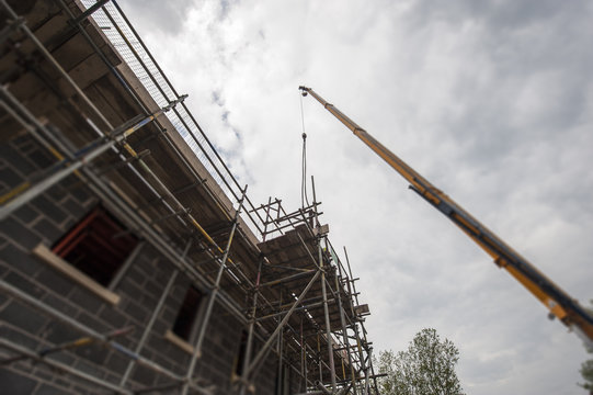 Scaffolding on building of construction site
