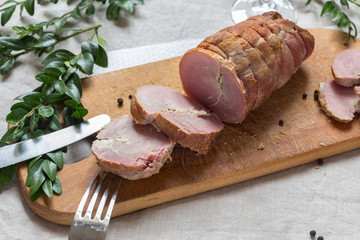Smoked ham on a chopping board