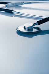 Medical concept image. Stethoscope seen from above.  A lot copy space around the product. Top view.