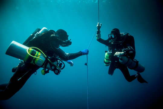 Underwater view of two technical divers Lombok, Indonesia