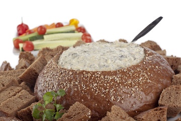 pumpernickel bread filled by delicious spinach dip