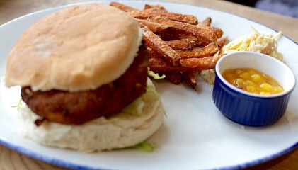Vegetable burger with sweet potato fries 
