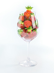 red strawberries in wine glass