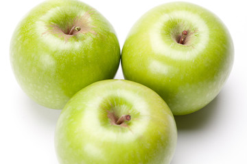 three sweet green apples