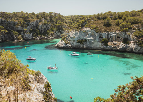 High angle view of yachts anchored at Cala Macarella, Menorca, Spain
