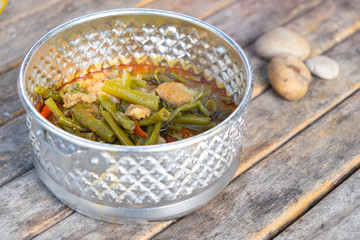 Pork curry with water spinach (Tae-pho soup) in tiffin carrier