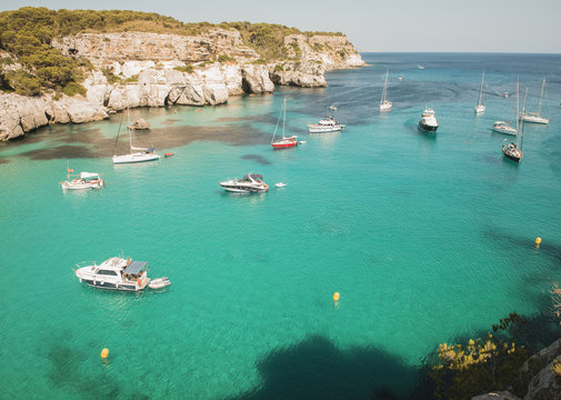 High angle view of yachts anchored in bay at Cala Macarella, Menorca, Spain