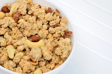 Muesli in bowl on table