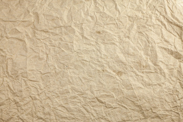 Crumpled eco paper textured background.