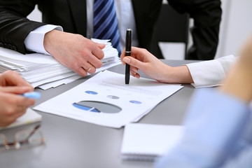 Close up of business people at meeting