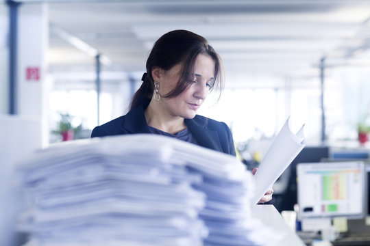 Administrative staff working alone in office