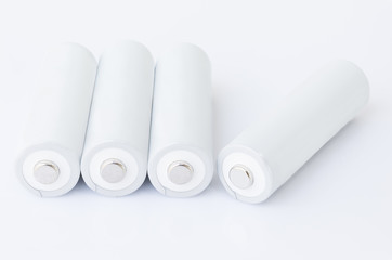 AA batteries over white