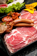 Premium raw japanese kobe beef sliced on plate
