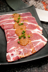 Premium raw japanese kobe beef sliced on plate