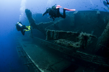 Underwater view of divers investigating MS Zenobia shipwreck, Larnaca, Cyprus
