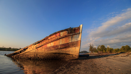 Abandoned Ship during sunset moment at sabah borneo malaysia Image has grain or blurry or noise and...