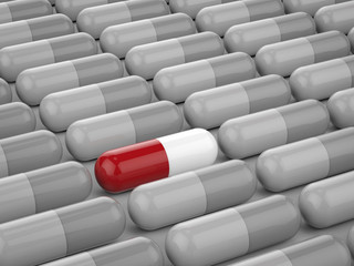 leadership concept with red tablet among white tablets