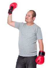 Old man raising up his arm with boxing gloves