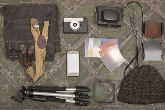 Photography equipment on table, overhead view