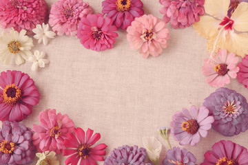 Fototapeta na wymiar Pink flowers copy space background, selective focus, toning
