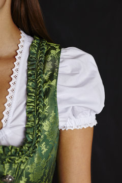 Partial view of young woman in Dirndl