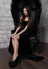 Sexy woman in long black dress