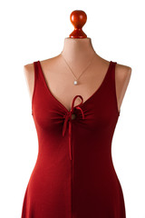 Red dress with keyhole neckline. Keyhole dress on beige mannequin. Girl's attractive stretch dress....