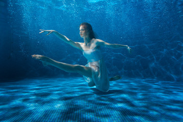 Woman under water in the dance.