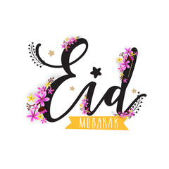 Stylish text Eid Mubarak with pink flowers.