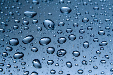 Water drops on the metal closeup