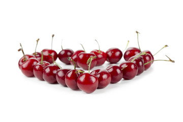 red cherries forming heart
