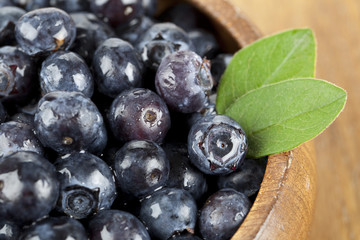 blueberries in wooden bowl