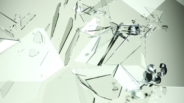 Pieces of splitted or cracked glass in slow motion. Alpha matte