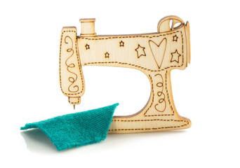sewing machine toy on white