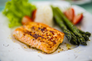 Salmon, asparagus with fresh strawberries, light diet

