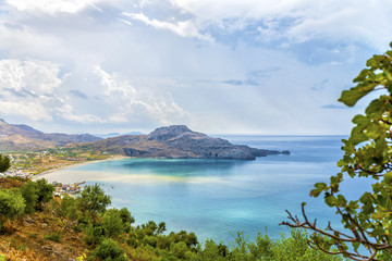 Fototapeta na wymiar Beautiful panoramic view on the bay and beach at Plakias village after the storm.Picturesque natural landscape.Crete island. District of Rethymno.Greece.Europe.