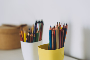 Colored pencils in a cup