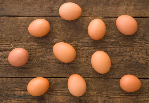 Chicken eggs on the wooden background