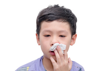 Young Asian boy wipe blood from his nose by tissue paper