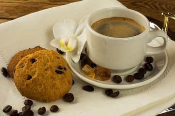 Coffee cup and cookies on the serving tray
